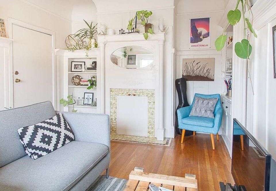period charm including built ins, fireplace, and colums