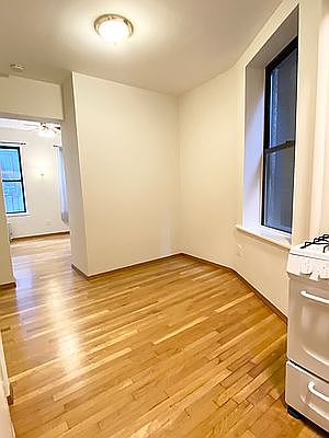 4th image of 63 E 7th St APT 8
