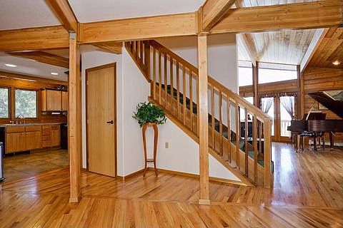 Open entry with beamed ceilings