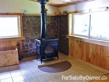 Dutch West woodstove in bonus room
						:
						Relax by a cozy fire this winter!