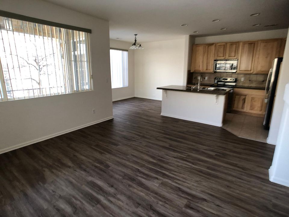 Newer LVP flooring in living room and dining room