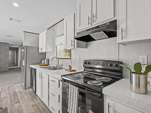 5th image of 1118 E 121st Pl