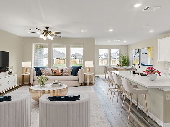 Open concept living space. Note Sample product photo - actual exterior and interior selections may