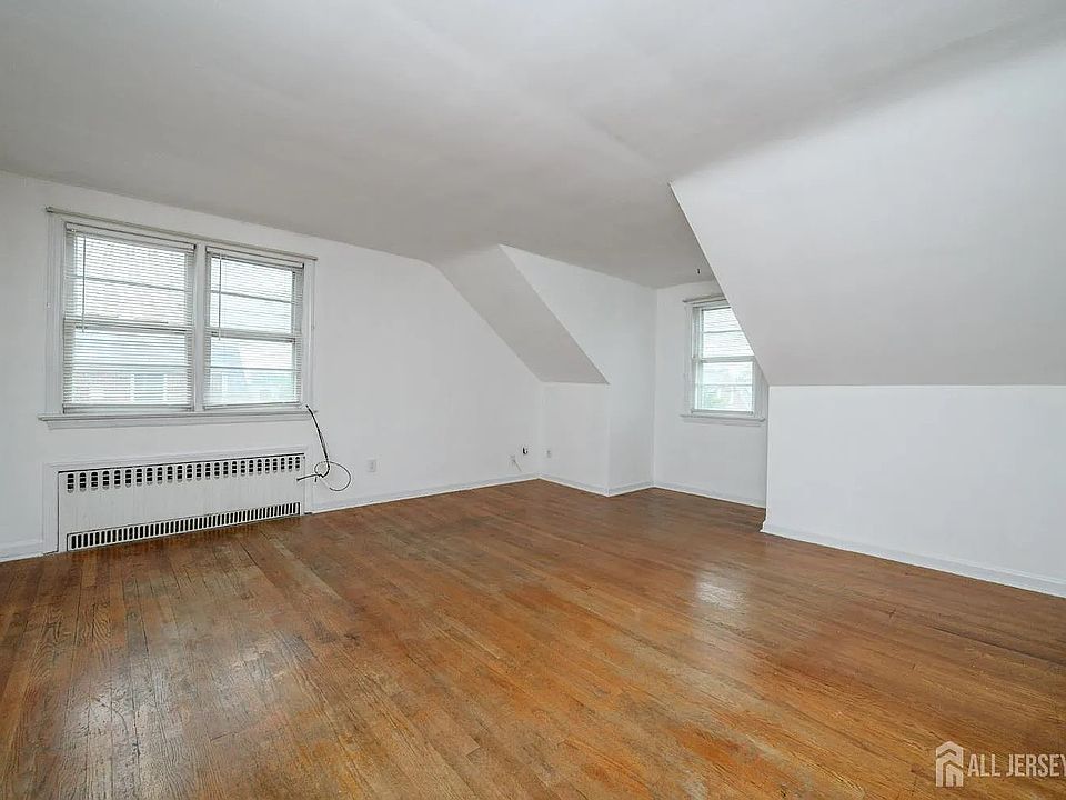 Living Room:
Spacious living room with hardwood floors