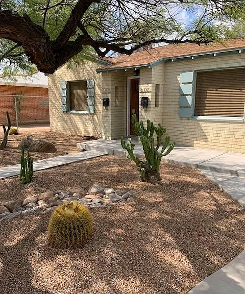 Professionally landscaped by Plants of Distinction. The lovely cereus cacti will produce beautiful white blossoms next summer. Low water and no maintenance! Cement patio ready for a Bistro table and chairs.