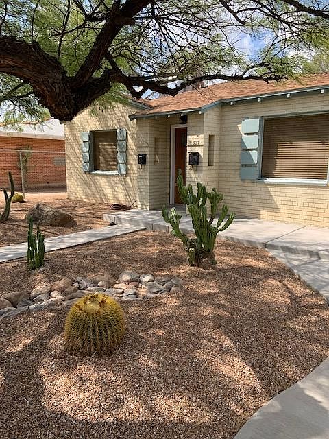 Professionally landscaped by Plants of Distinction. The lovely cereus cacti will produce beautiful white blossoms next summer. Low water and no maintenance! Cement patio ready for a Bistro table and chairs.