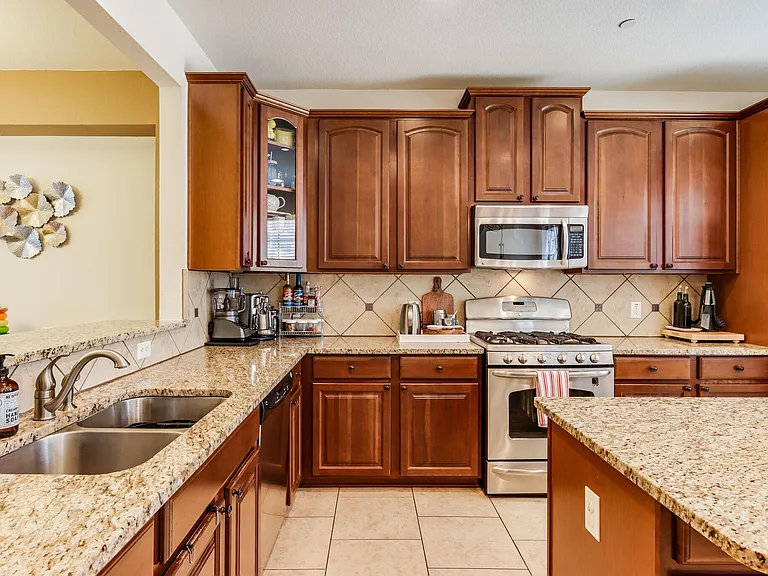 Kitchen is a Chef's Dream - SS appliances, Gas range, Granite Countertops.