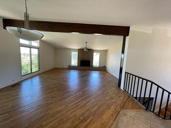 Large living room with fireplace.