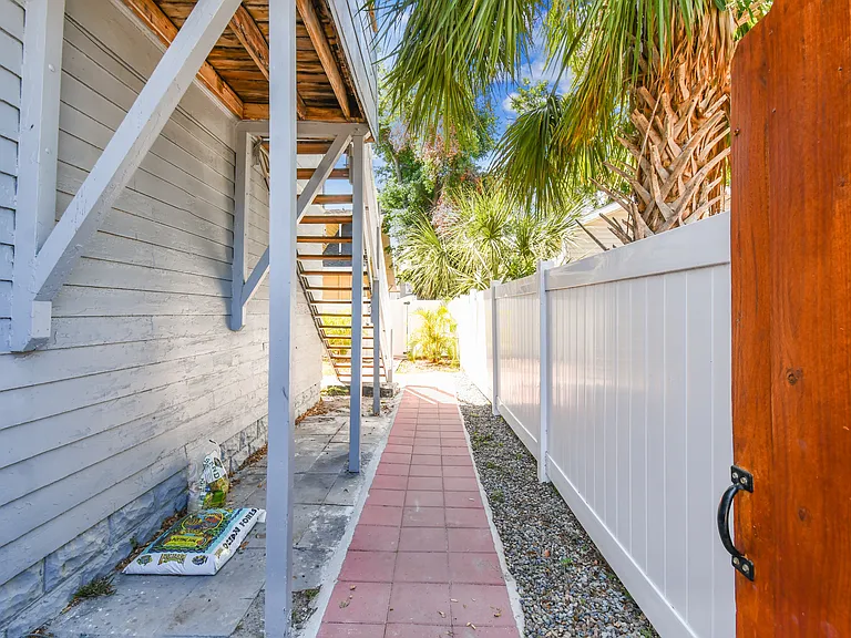 Entrance to unit thru gate.