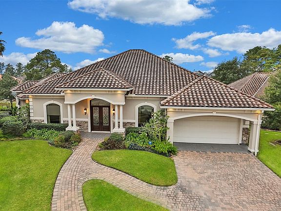 PACKED WITH STYLE THIS THREE BEDROOM HOME HAS A SPLIT FLOOR PLAN - The split floor plan offers privacy in each room with the master bedroom in the back of the home with views galore! The seller made sure this home had lots or architectural lighting i