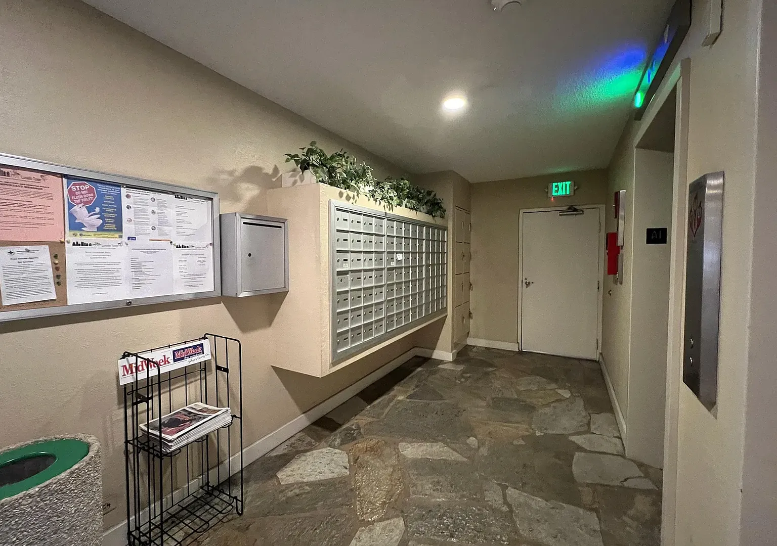 Studio with full kitchen, bath, in-unit laundry, partially covered assigned parking in secure bui... — Photo 2