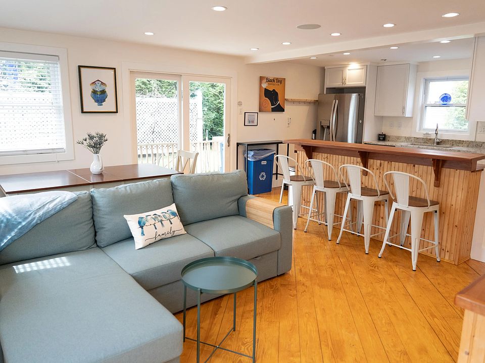 Open Concept Living Room with slider to the deck