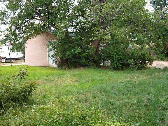 Rear of property. Alley access behind.