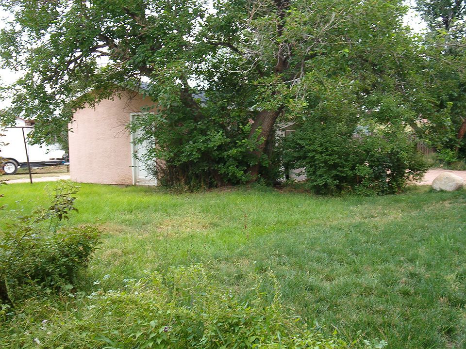 Rear of property. Alley access behind.
