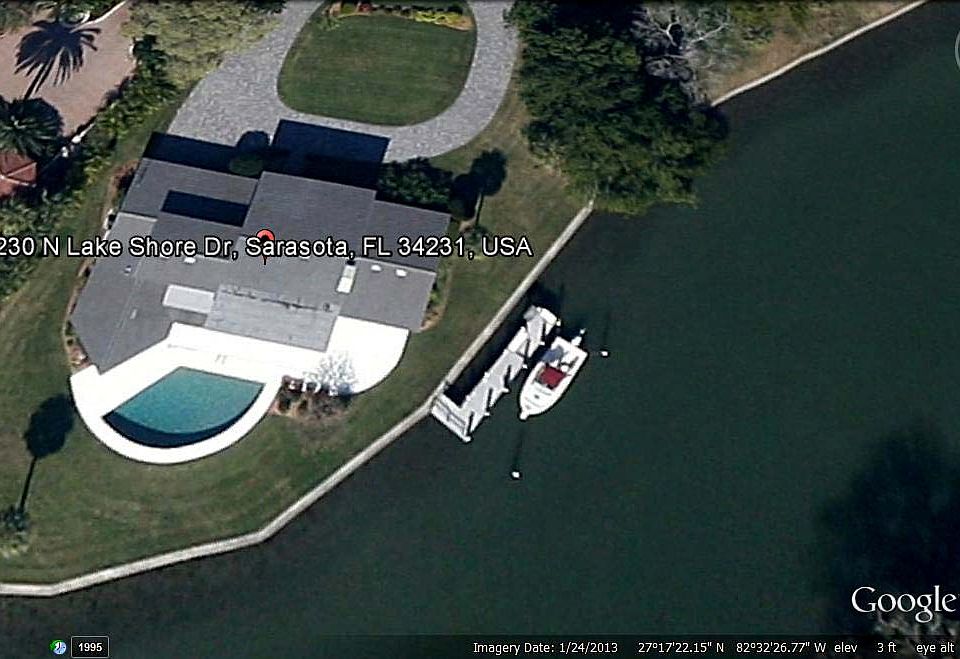 View of property with yacht 