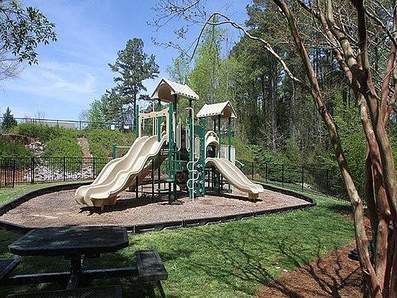 Playground behind big pool