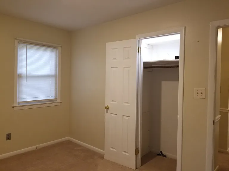 1st bedroom from inside.
Window in picture is from previous pic (facing backyard).
1st bedroom closet with light.