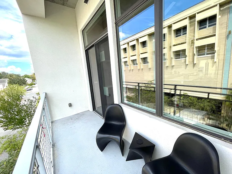 Sliding glass door access to the balcony from the living room