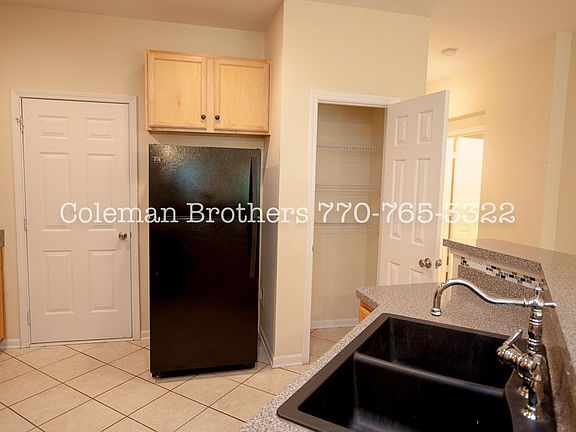 Door to Garage. Refrigerator. Pantry.
