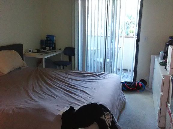 master bedroom with private balcony