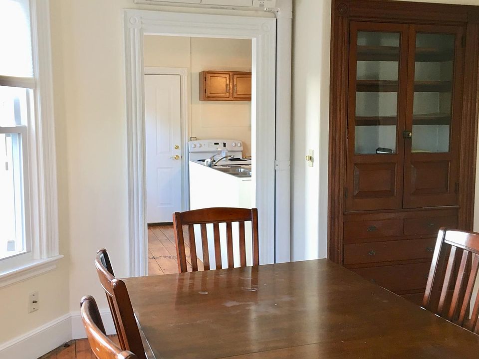 Built-ins in dining room. Heat pump unit (over door) ptovides heating and cooling .