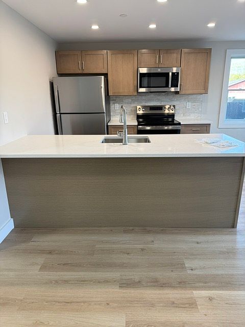 1st image of 6955 Main Rd #3