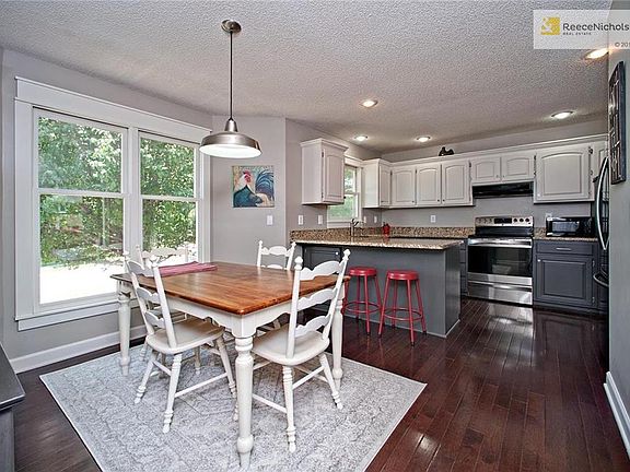 Updated Kitchen with Breakfast Bar and Add'l Breakfast/Dining Space