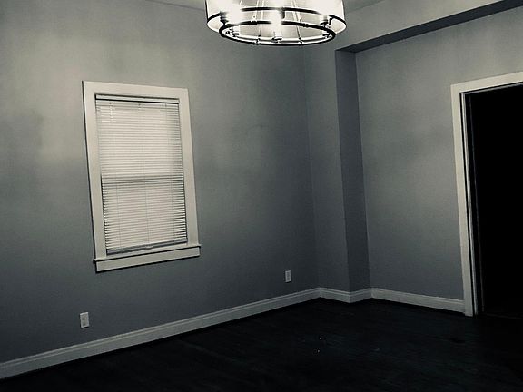 Large living room with updated fixtures