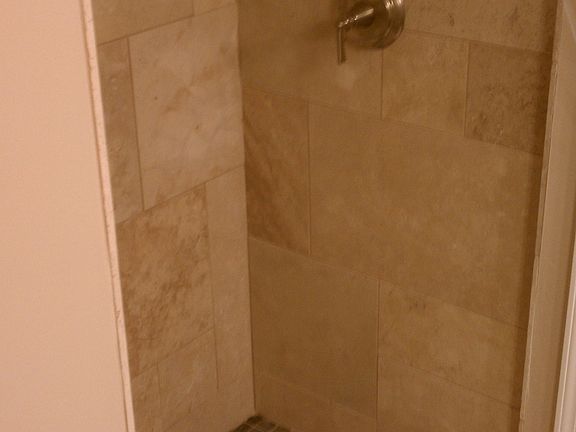 Master Shower, Travertine walls and slate floor with Kohler Fixtures