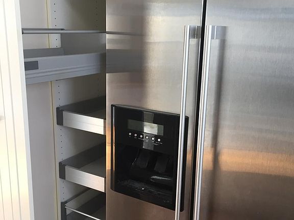 Updated kitchen with pull-out pantry and lots of cabinet space