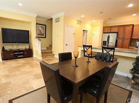 Open floor plan concept with living, dining, and kitchen all in one large space.