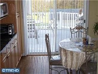 dining area leading to deck