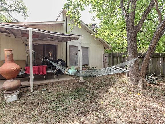 Backyard, covered patio roof has been replaced. Sliding door