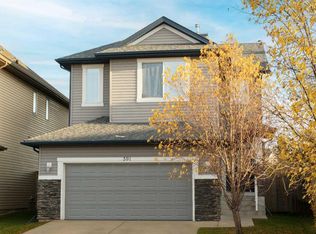 391 N Cimarron Blvd, Okotoks, AB T1S 0A9