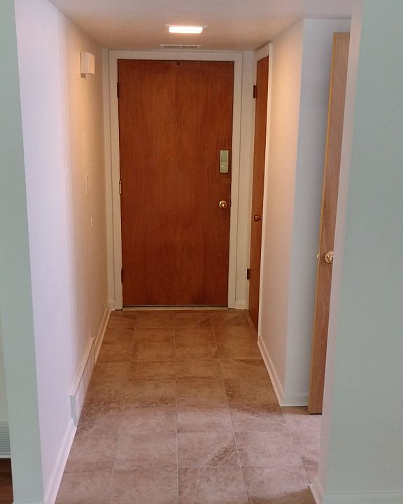 Entry way - New tile floor