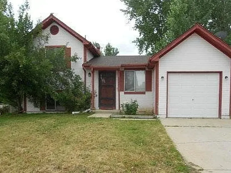 4902 S Rifle Ct — Photo 1