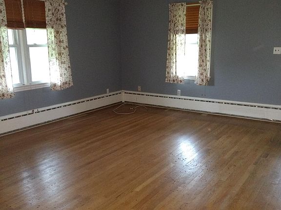 Large Living room with oil baseboard heat