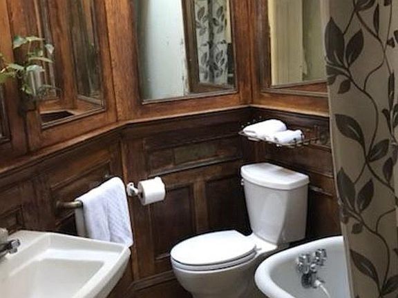 Bathroom with oak paneling