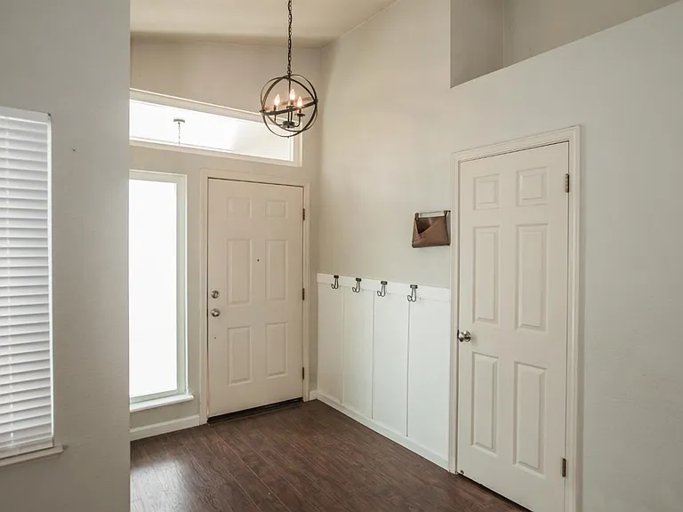 front entry with mud room and mail holder