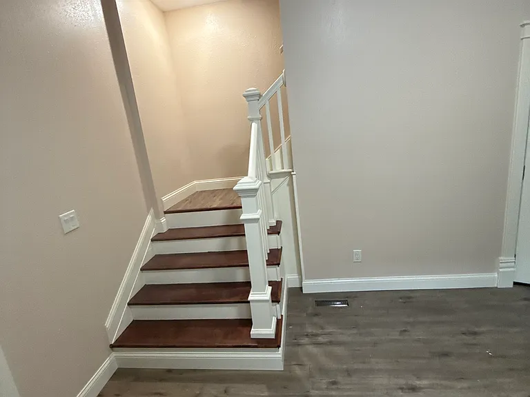 Stairs to upstairs from kitchen