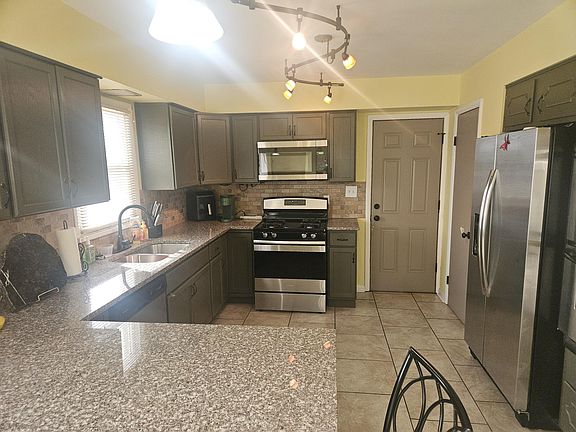 4th image of 1241 W 56th Ave