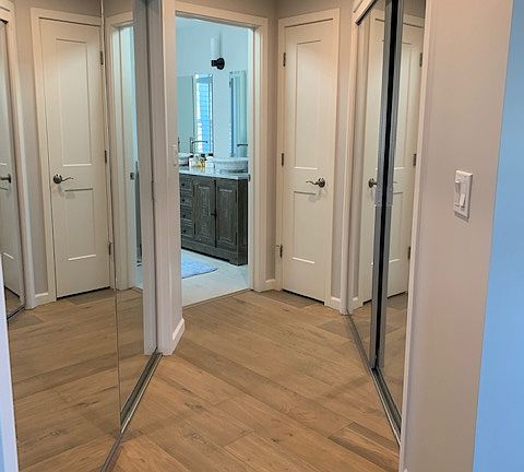 Primary bedroom with 2 walk in closets