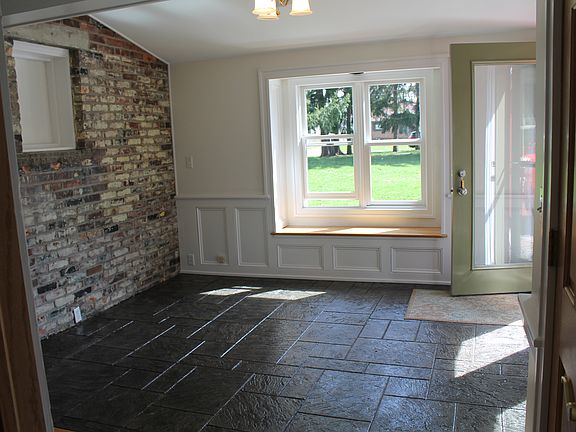 Entryway with exposed brick