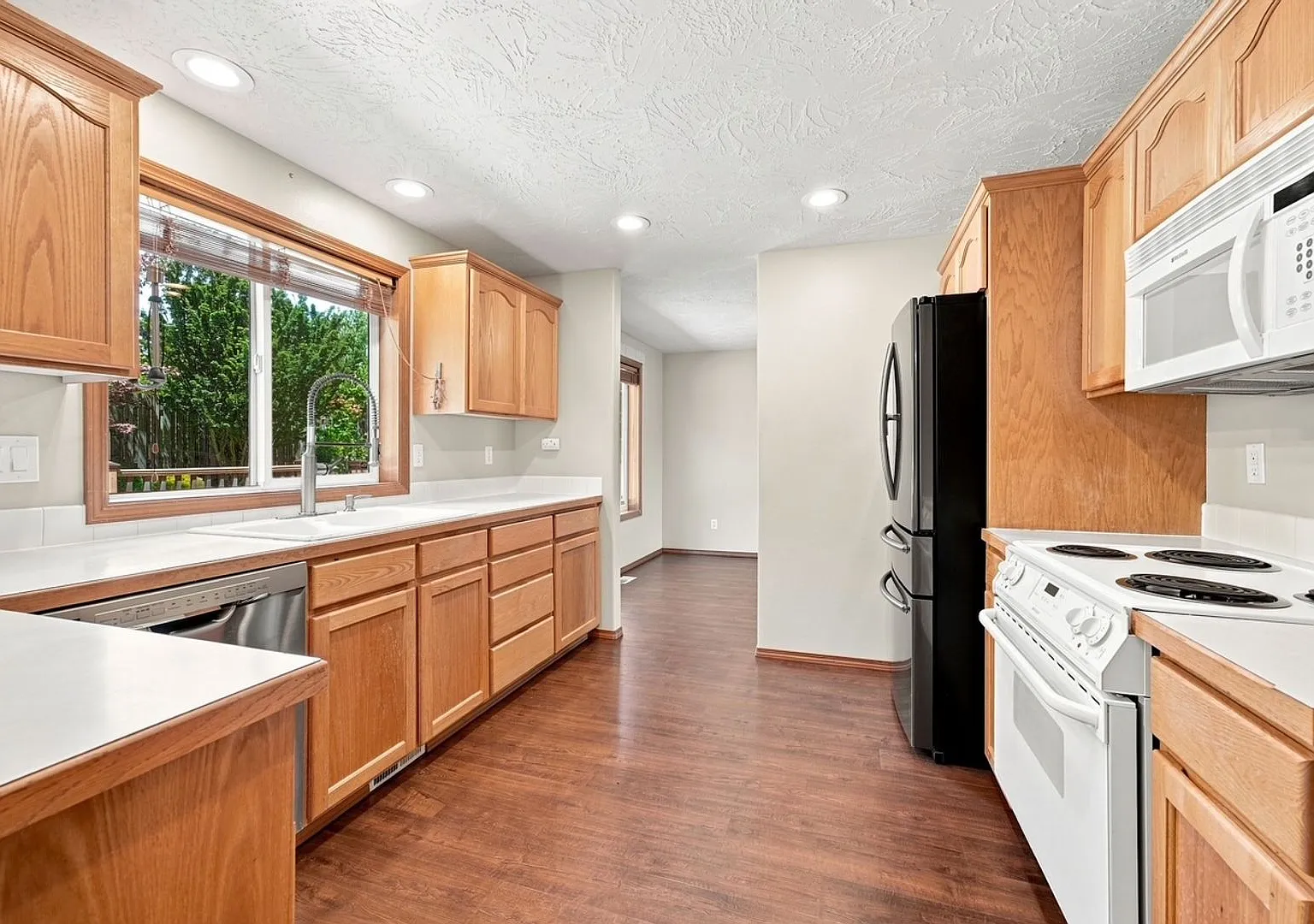 Charming 3-Bedroom Home with a Private Landscaped Yard Oasis — Photo 3