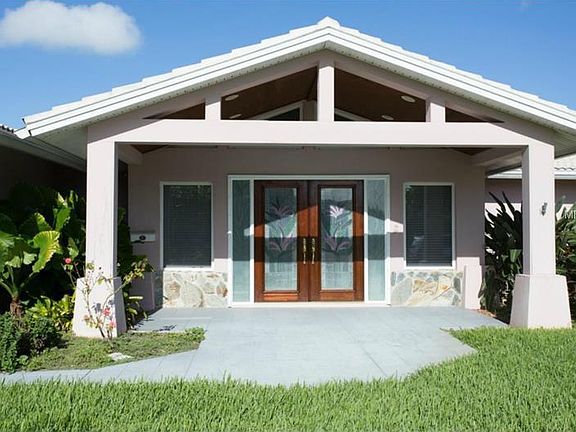 Front of house. Covered porch.
