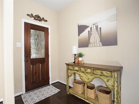 Entry way with wood floors.