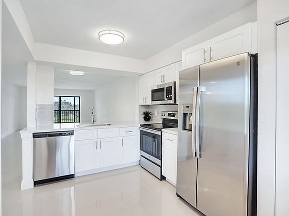 3rd image of 7320 Amberly Lane #403