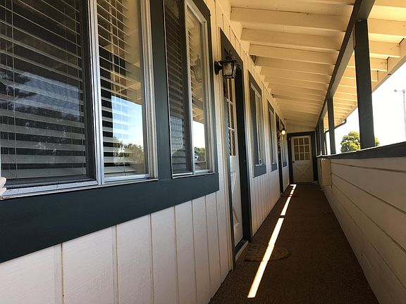 Above carport to front door
