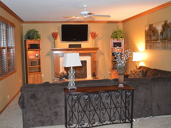 Drop down family room.
						:
						From the kitchen to the family room with 3 large windows overlooking deck.