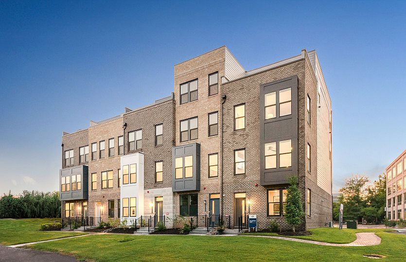 New 4-level townhomes with rooftop terraces by Pulte Homes at Reston Arboretum.